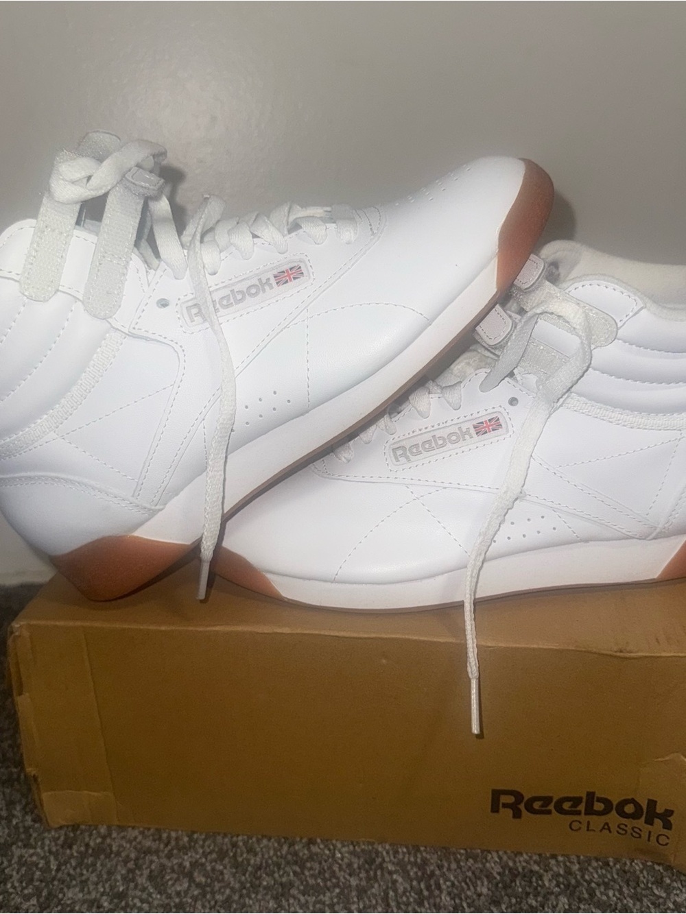 Reebok Women’s White Leather Sneakers with Gum Accents